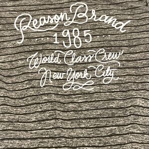 Reason brand T-shirt.